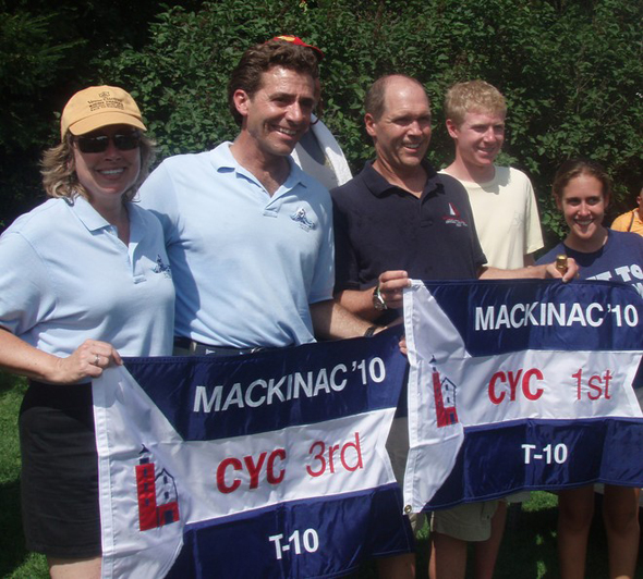 (L) Nancy and Tim Snyder,(Cheap Thrill) Mark, John and Gretchen Kroll (Retention) - T10 section Race to Mackinac 2010  Event Media